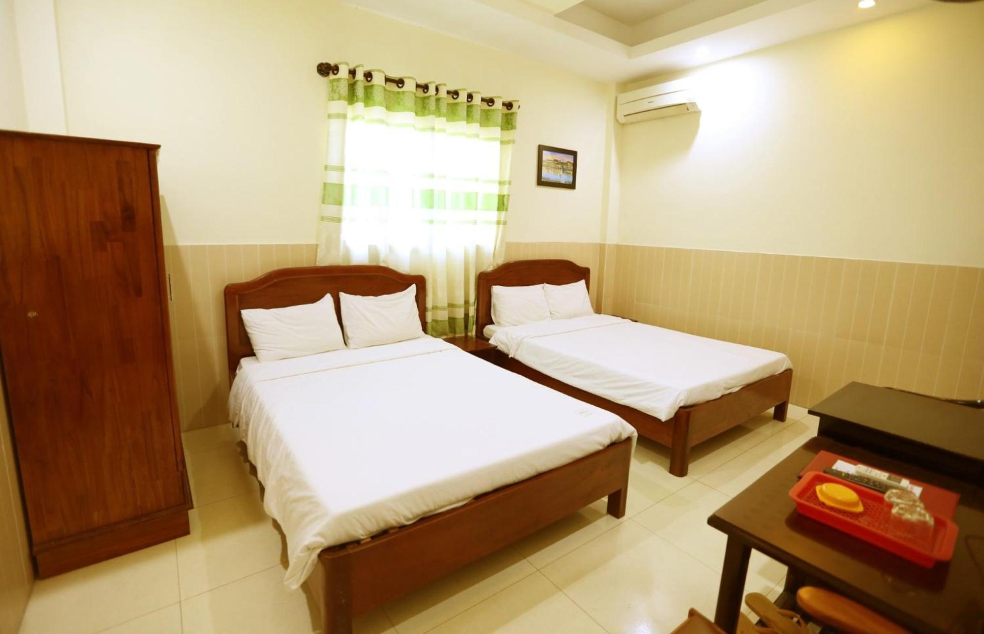 Minh Quang Hotel Hội An Buitenkant foto